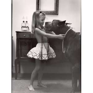 Model Posed Putting Costume Jewelry on Great Dane, Childrens Fall 