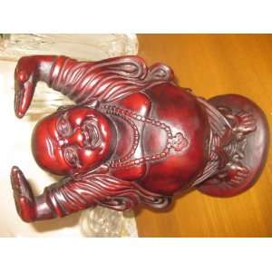  Laughing buddha statue in resin