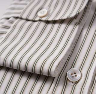 White cotton base with tasteful green stripe pattern.