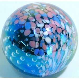   and pink decorated bubbled art glass paperweight