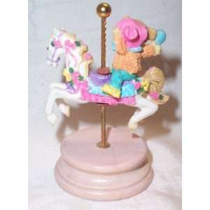  Teddy Bear Riding a Carousel Horse