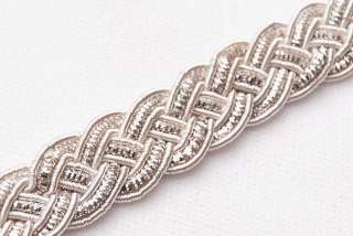 An unusual trim made of bullion cords braided into a Celtic knot 