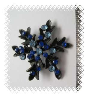 Pewter tone snowflake brooch, pin, blue rhinestones NEW  