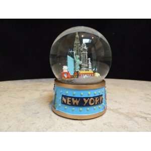   City At Its Best Rotating Musical Snow Globe 100mm