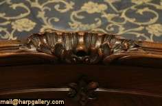 Artfully hand carved in France about 1890, this graceful bed fits a 