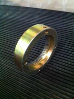Here we have a Ring nut for a cylinder head cover on a Sonik 100cc 