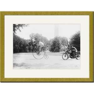  Gold Framed/Matted Print 17x23, Motorcycle cop chases a 