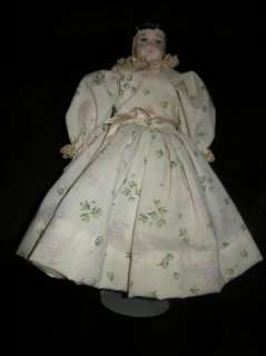Victorian styled China head doll lovers on dress  