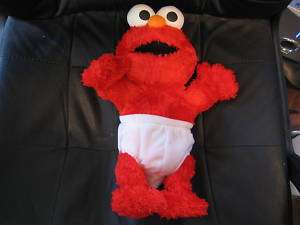 Baby UP UP Elmo doll works great talks and moves  