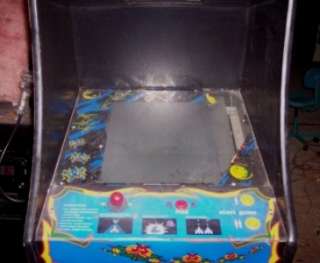 This is a used 1981 Galaga Arcade Video Game in Good Working Condition 