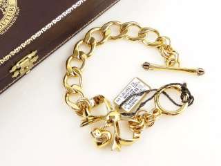 Authentic Juicy Couture gold plated bow started charm bracelet, will 