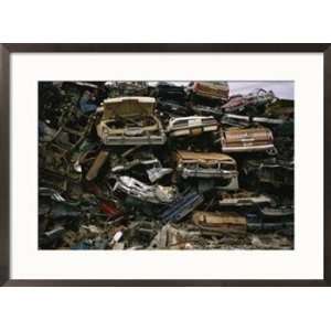  Piles of old cars, stacked and crushed, metal salvage yard 